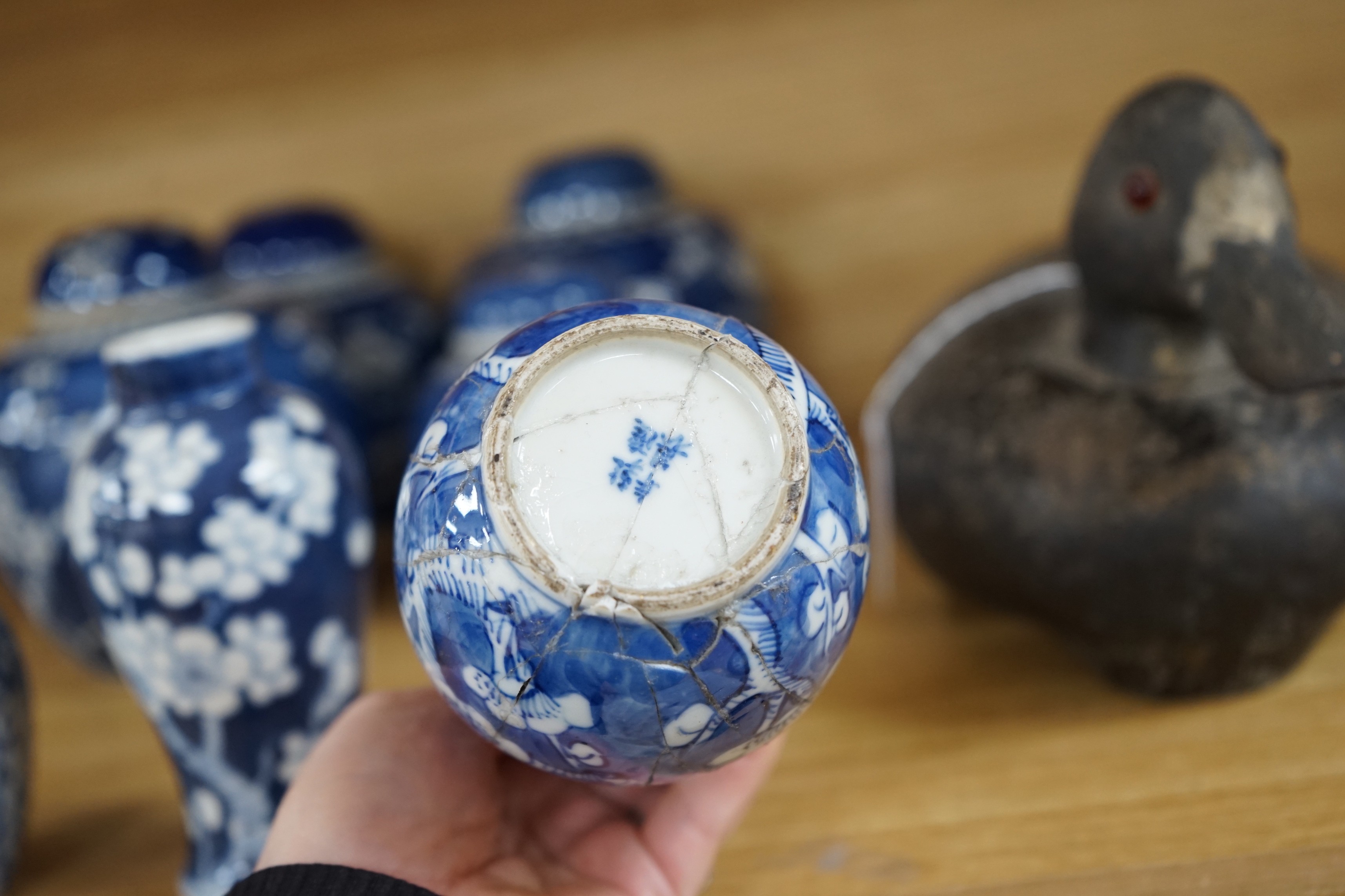 Four Chinese blue and white prunus pattern ginger jars, together with three similar vases. 19th/early 20th century, Tallest 15cm